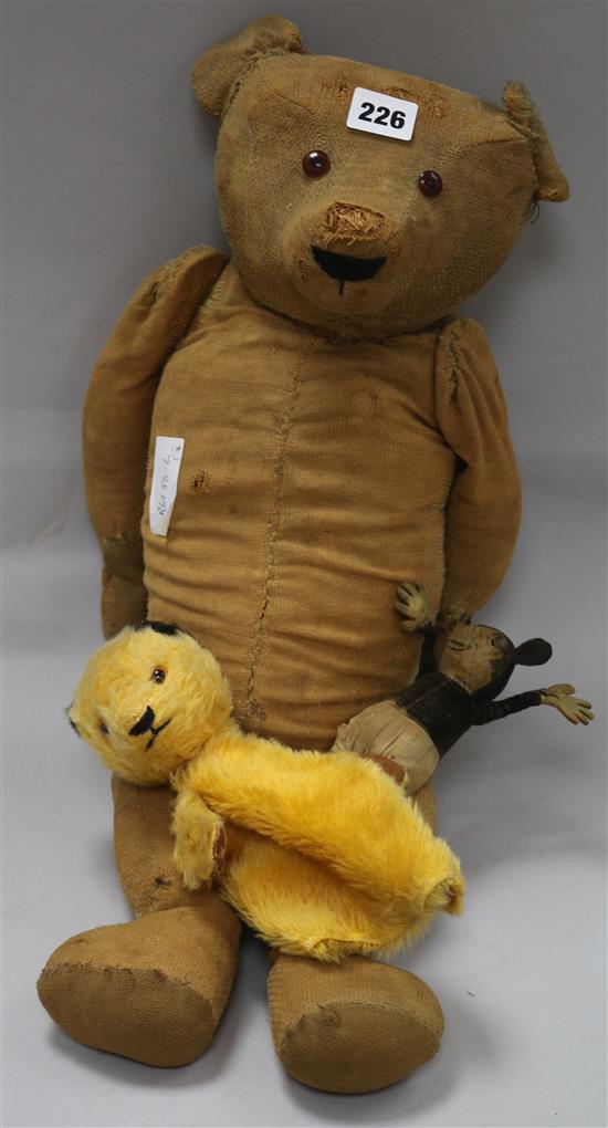 A Deans Ragbook Mickey Mouse, a Chad Valley Sooty hand puppet and an early 20th century teddy bear